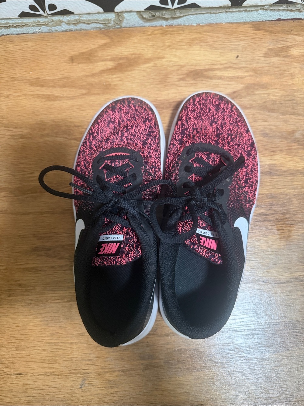 Nike Women’s Pink and Black Knit Athletic Sneakers